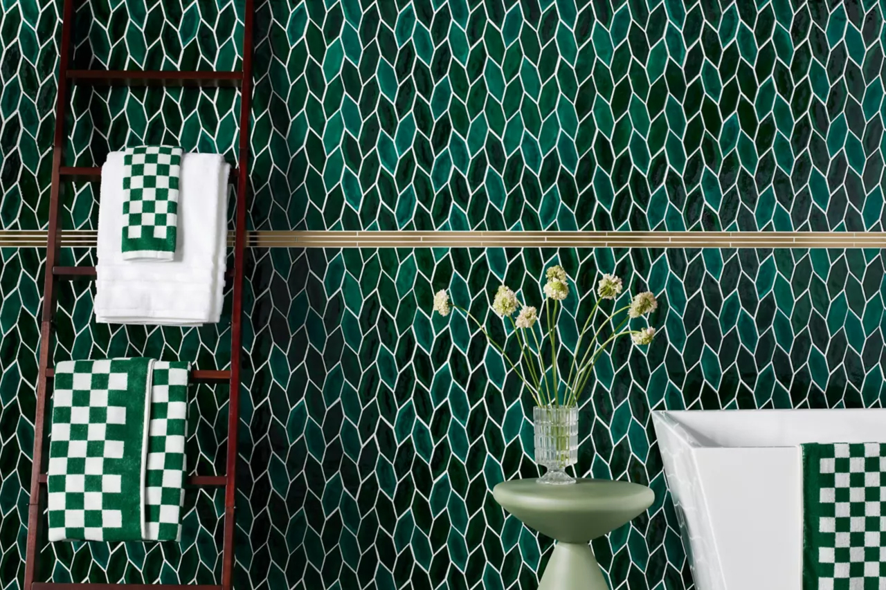 ibrant mosaic tile design featuring jewel-tone colors, a 2025 tile trend for bold interiors.
