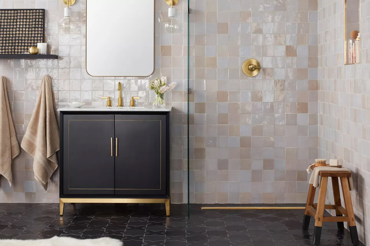 Glossy Zellige bathroom tiles in earthy tones, reflecting artisanal 2025 tile trends.